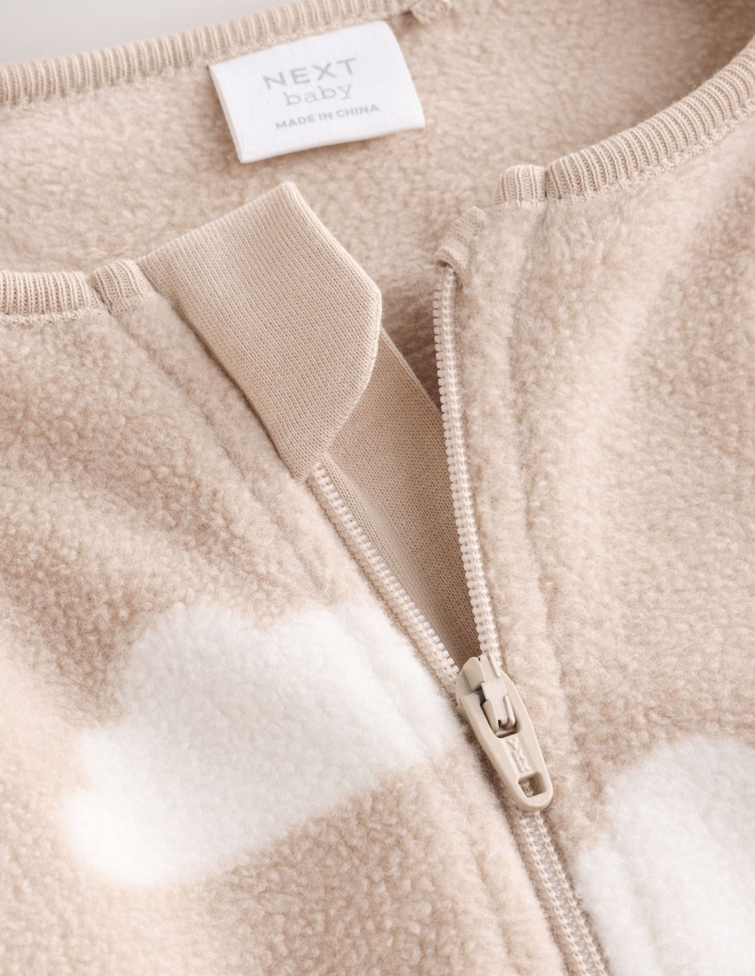 Neutral Micro Fleece Two Way
Zip Baby Sleepsuits 4 Pack