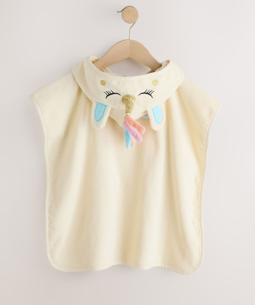 Ecru White Unicorn Towelling
Poncho