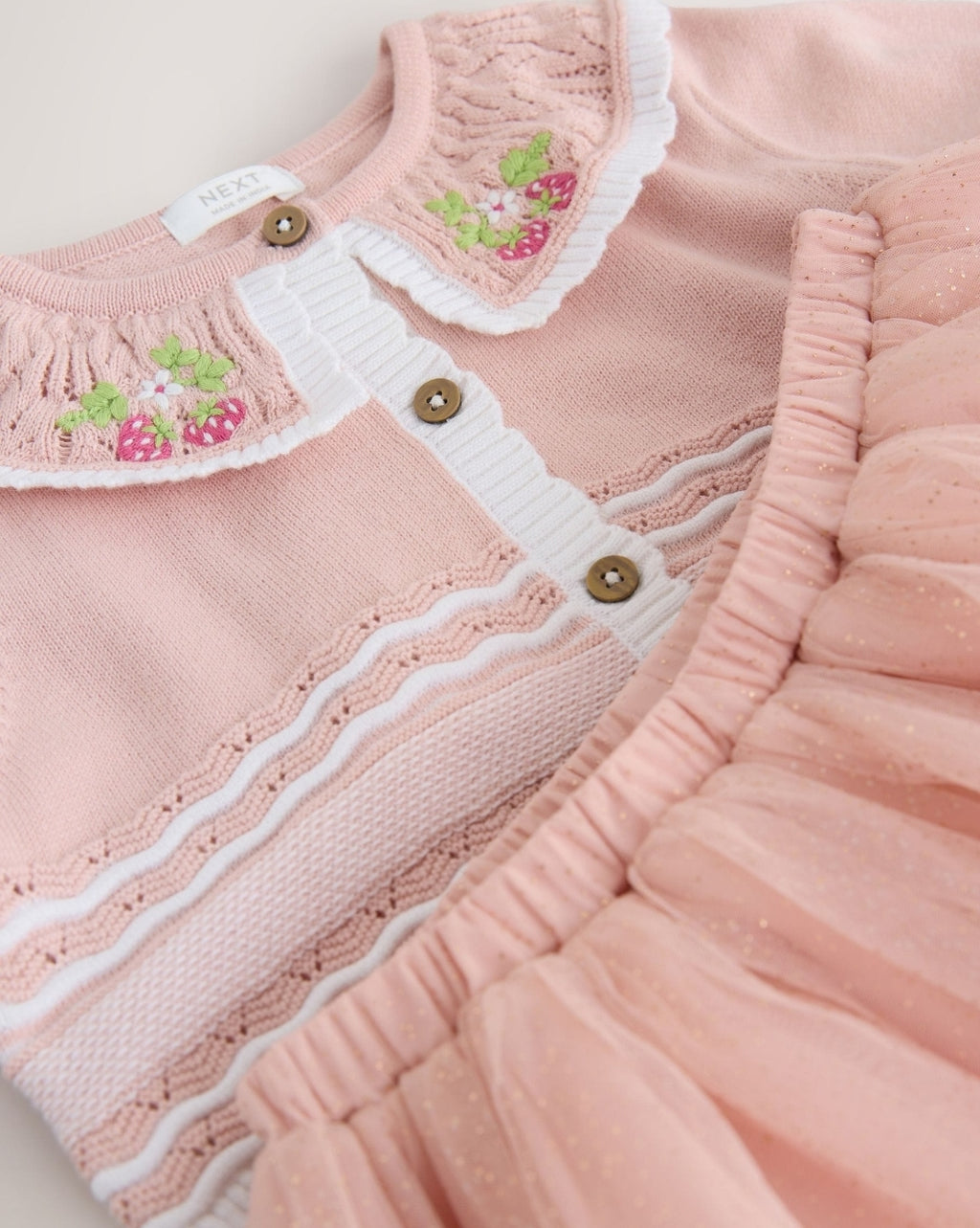 Pink Knitted Top And Mesh Skirt
Set