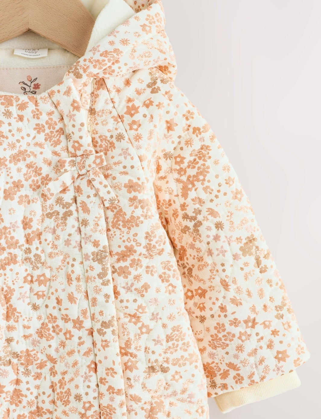 Ecru Floral Printed Baby Hooded
Crinkle Woven Pramsuit