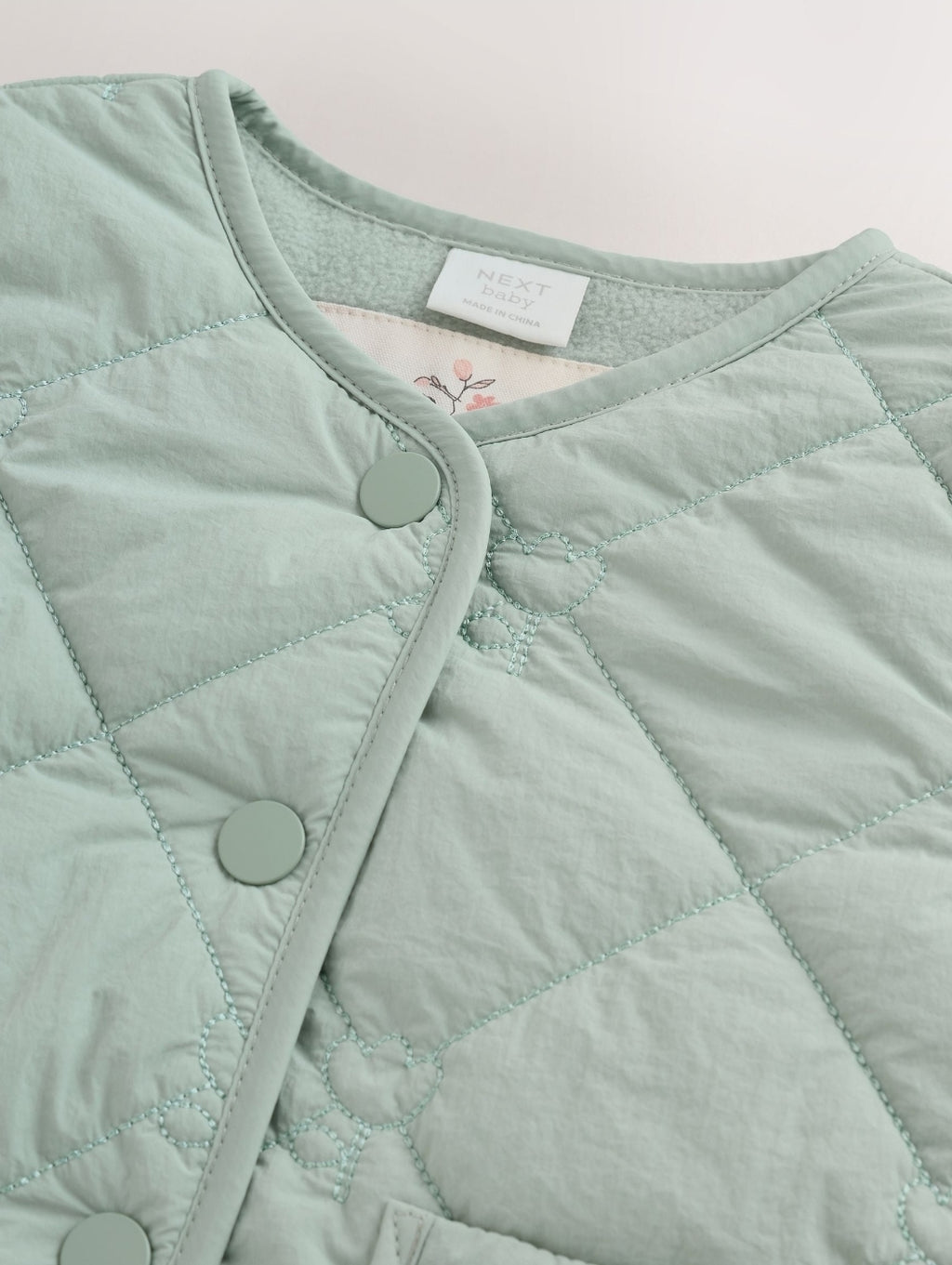 Sage Green Tulip Quilted Nylon
Baby Jacket