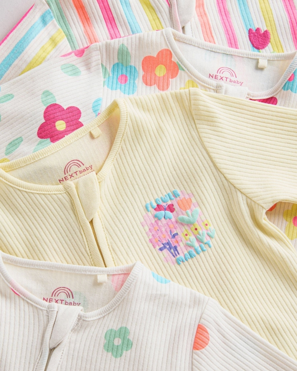 Yellow Two Way Zip Baby
Sleepsuits 4 Pack