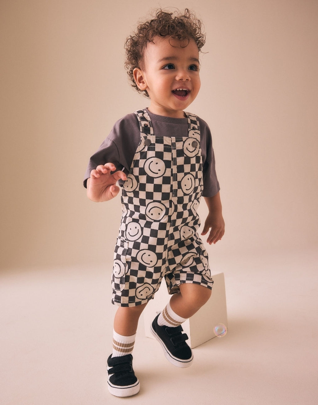Black/Neutral Happy Face
Checkerboard Dungarees