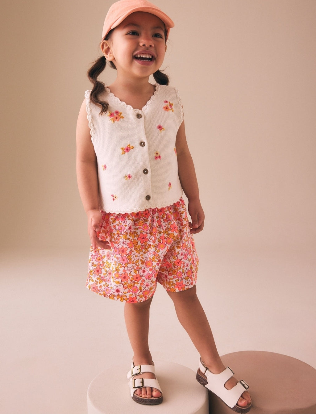 Fluro Pink Floral Knitted Waistcoat
And Shorts Set