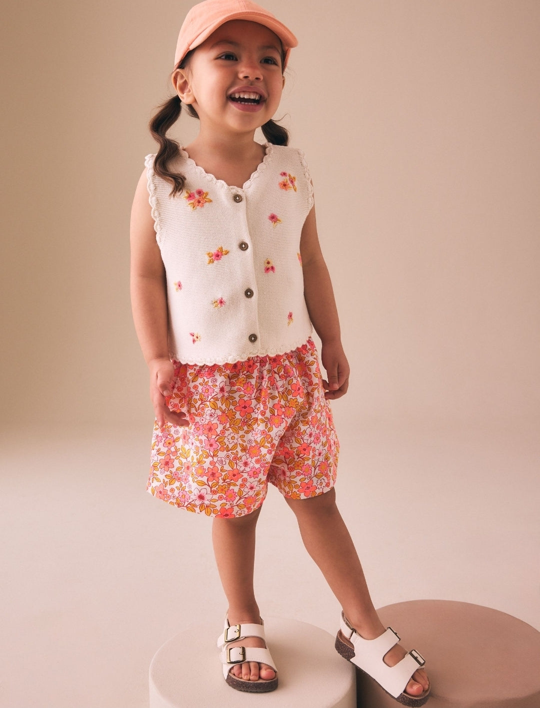 Fluro Pink Floral Knitted Waistcoat
And Shorts Set