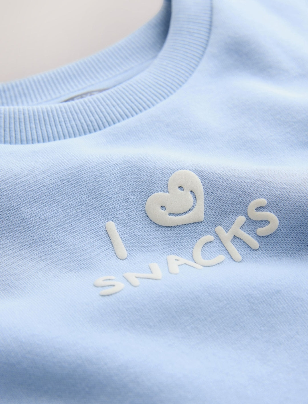 Blue I Love Snacks Printed Crew Neck
Sweat Top