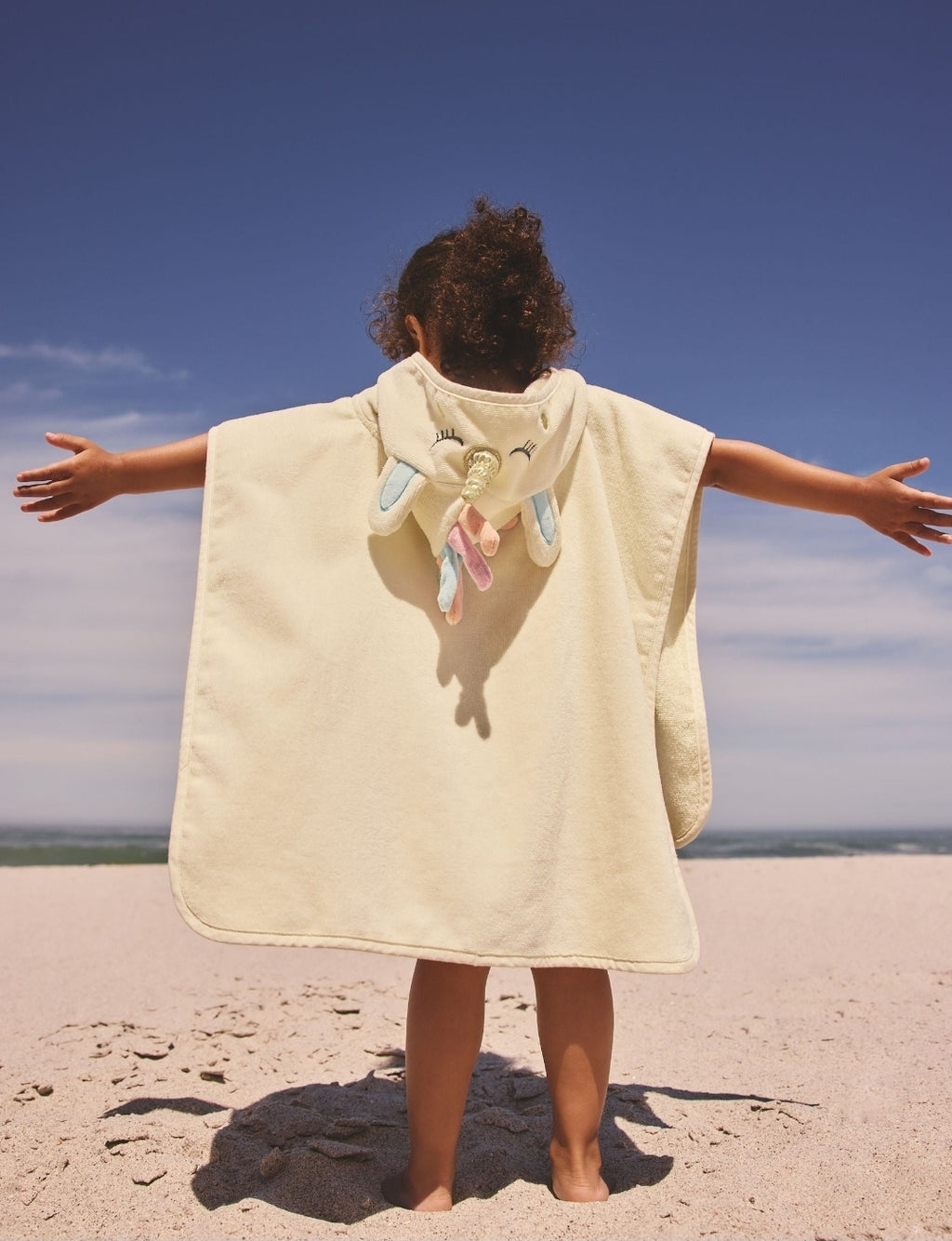 Ecru White Unicorn Towelling
Poncho