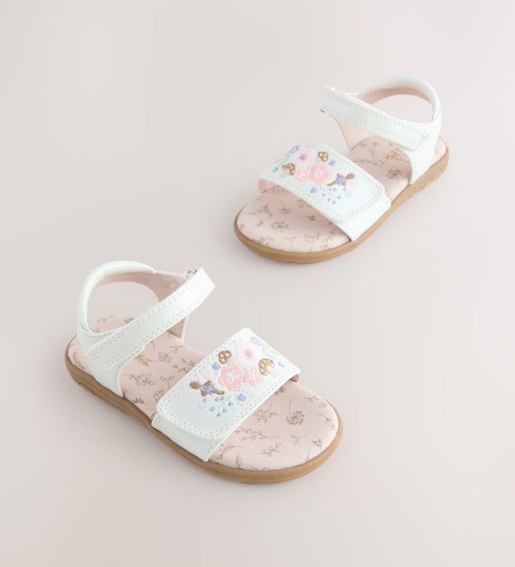 White Embroidered Touch
Fastening Sandals