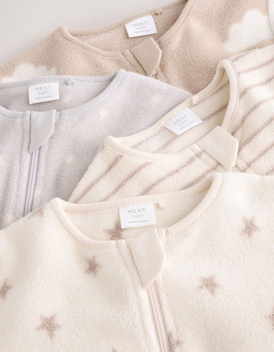 Neutral Micro Fleece Two Way
Zip Baby Sleepsuits 4 Pack