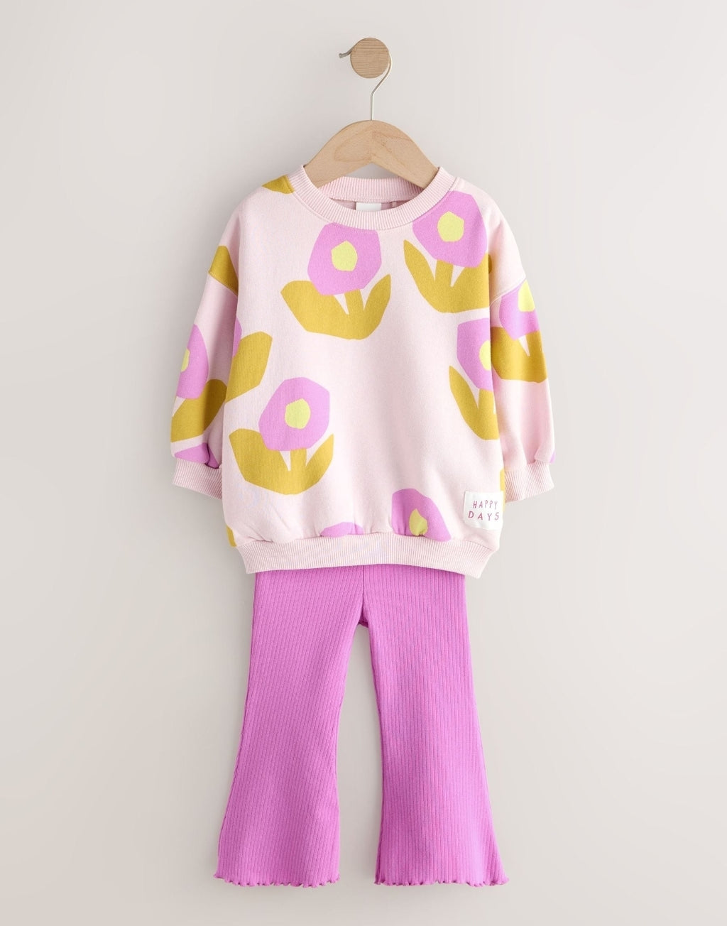Light Pink Flowers Crew Neck
Sweatshirt and Flare Leggings Set