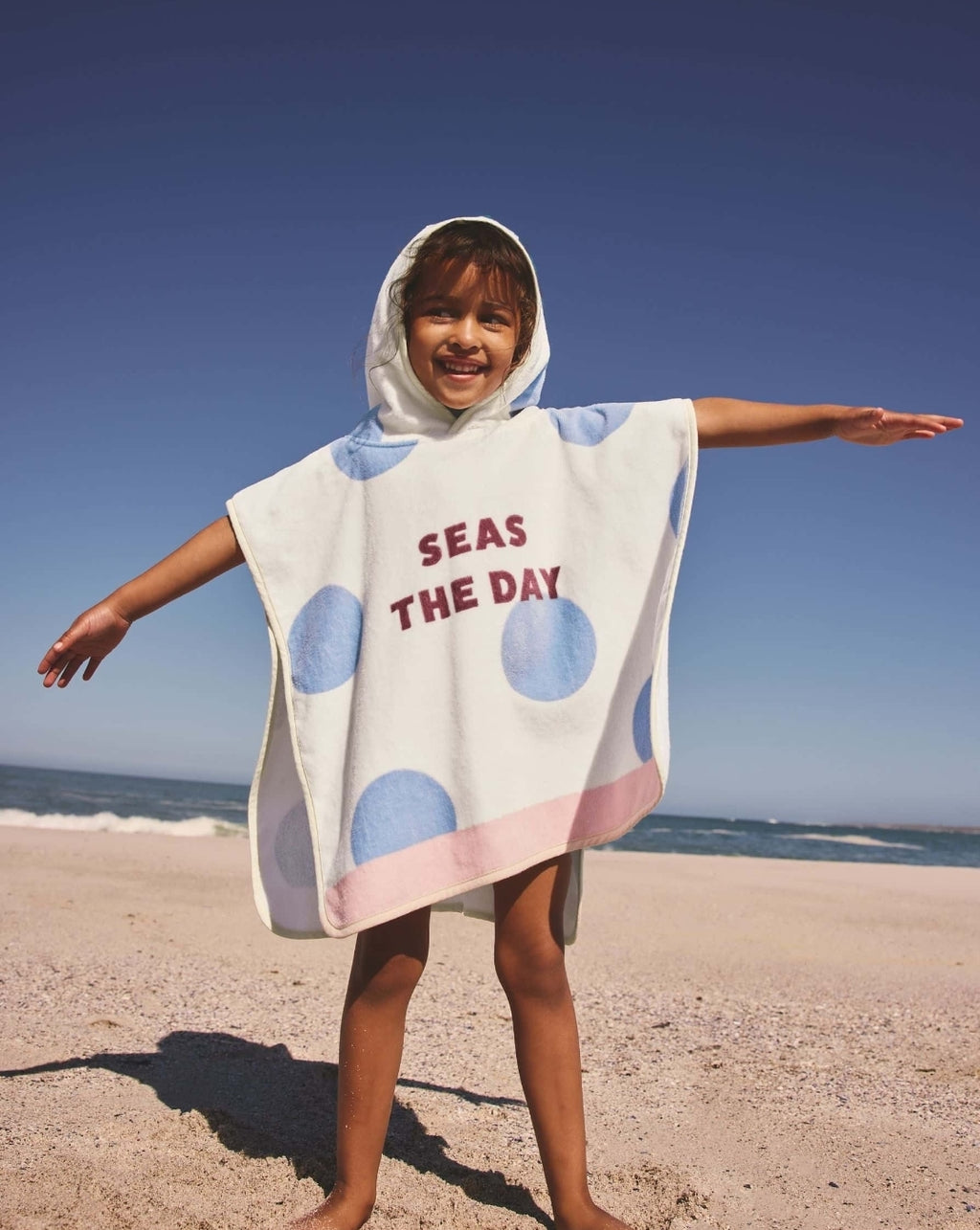 Neutral Polka Dot Slogan
Towelling Poncho