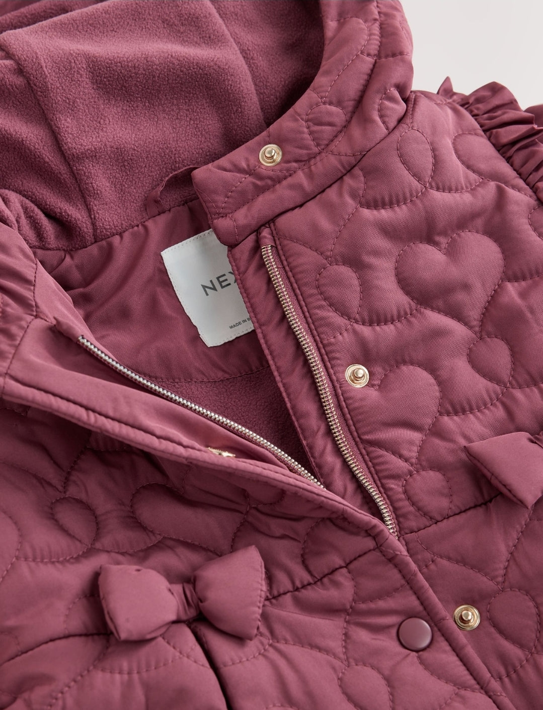 Dark Pink Shower Resistant 
Skirted Quilted Coat