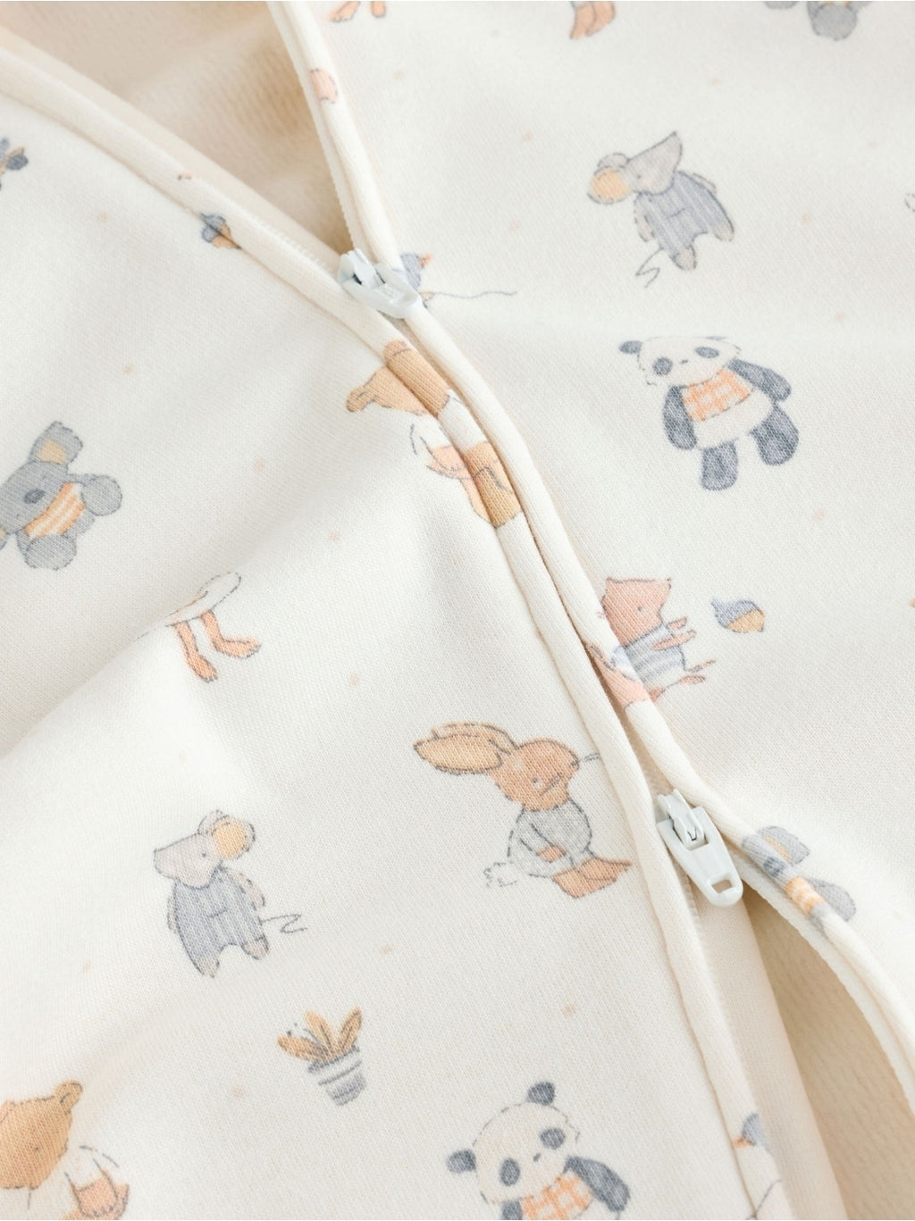 Neutral Animal Fleece Lined Two
Way Zip Baby Sleepsuit
