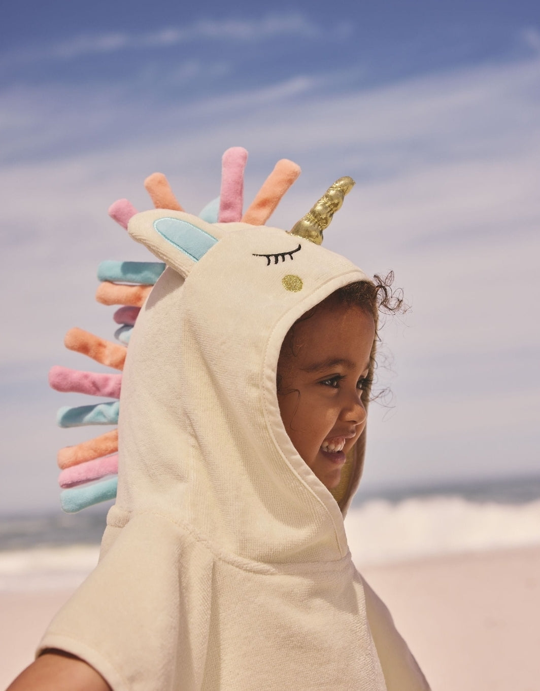 Ecru White Unicorn Towelling
Poncho