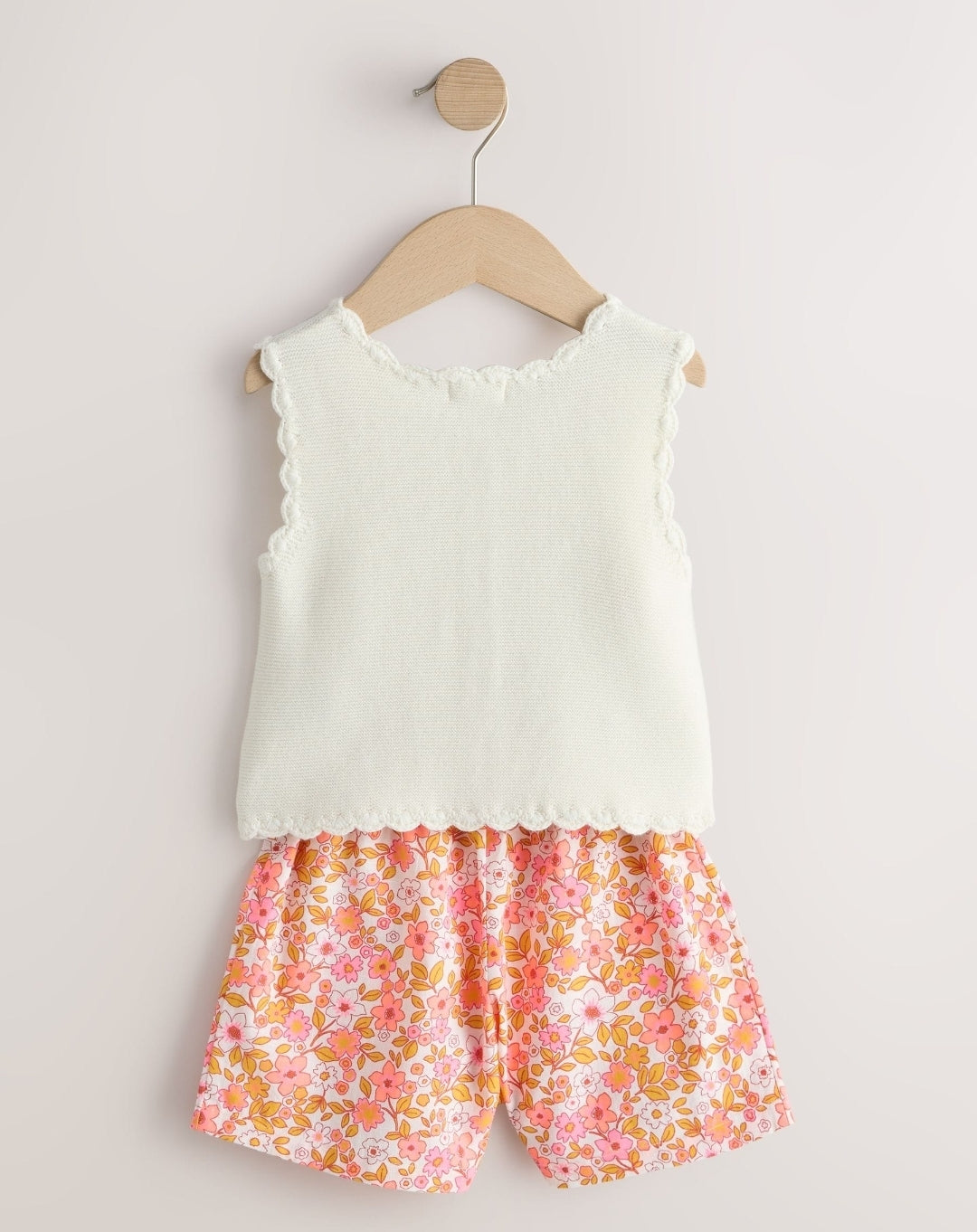Fluro Pink Floral Knitted Waistcoat
And Shorts Set