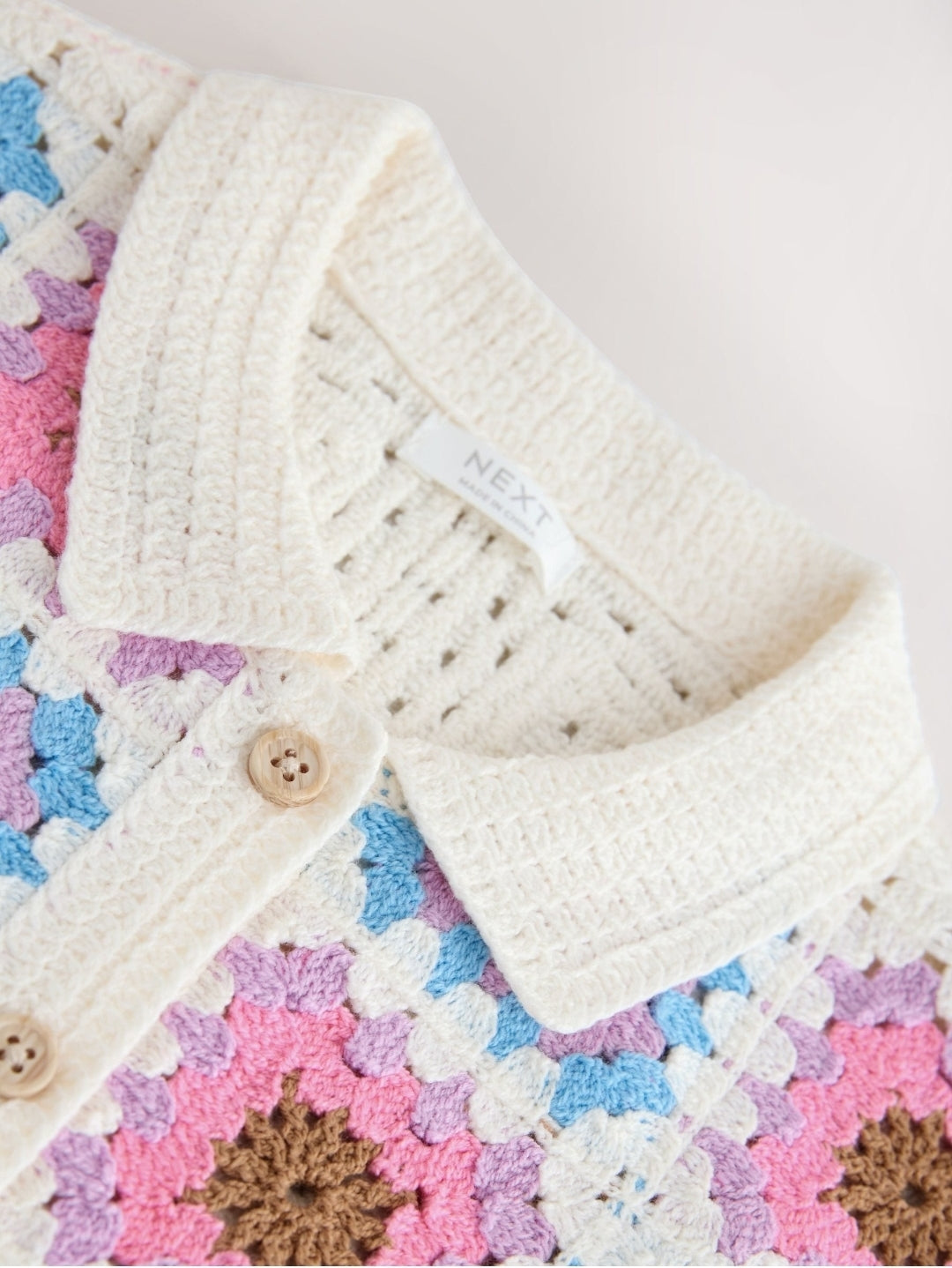 Cream Crochet Whale and Seashell
Top