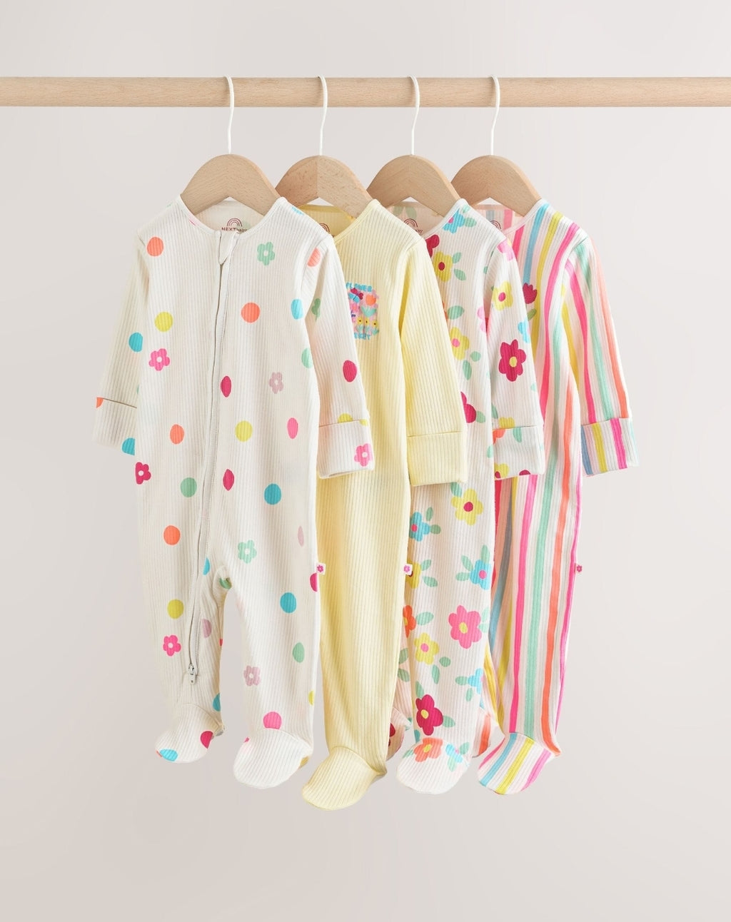 Yellow Two Way Zip Baby
Sleepsuits 4 Pack