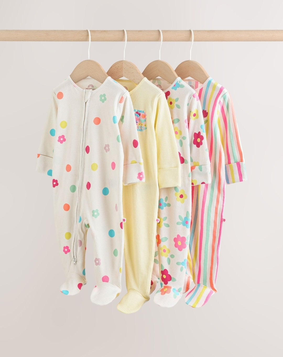 Yellow Two Way Zip Baby
Sleepsuits 4 Pack