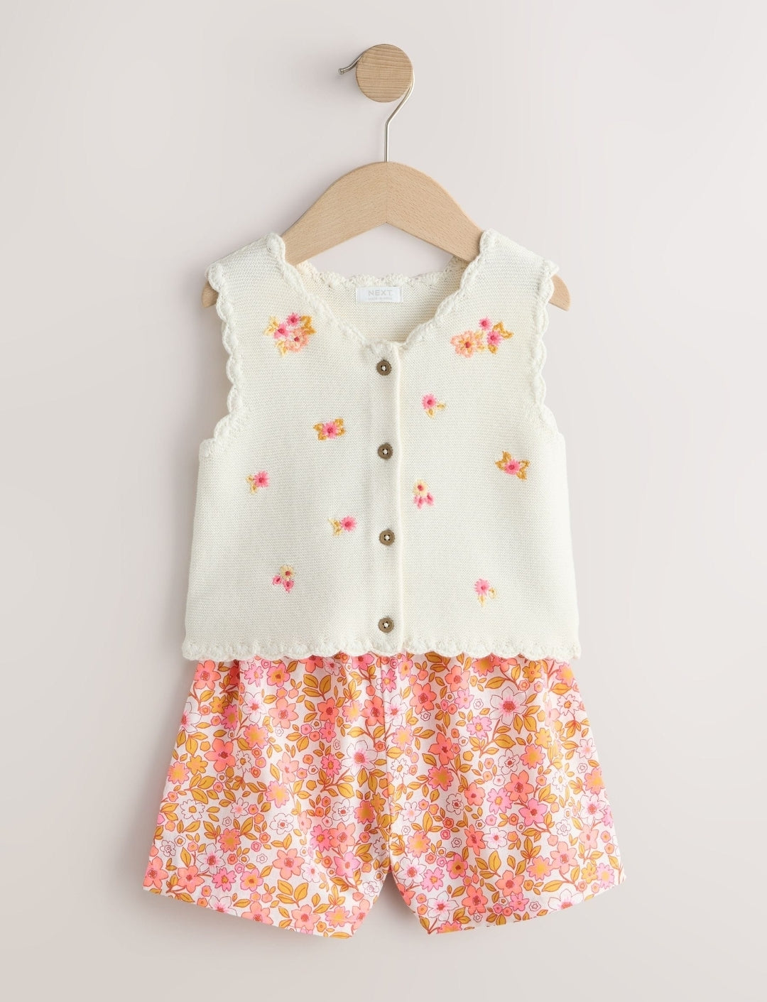Fluro Pink Floral Knitted Waistcoat
And Shorts Set