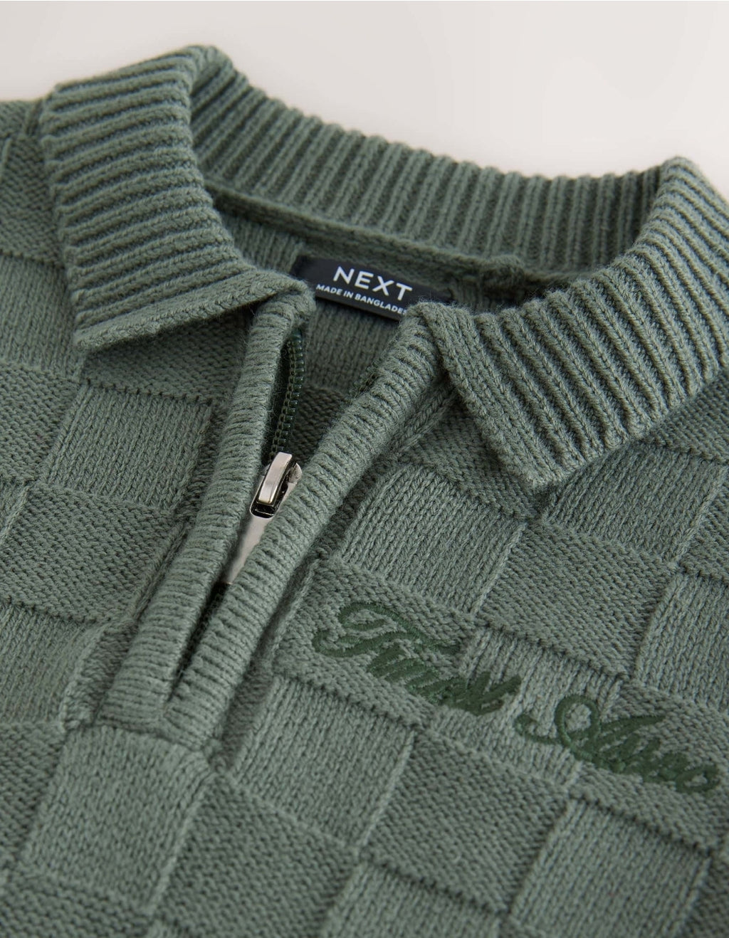 Green Textured Knitted Zip Neck
Polo Shirt
