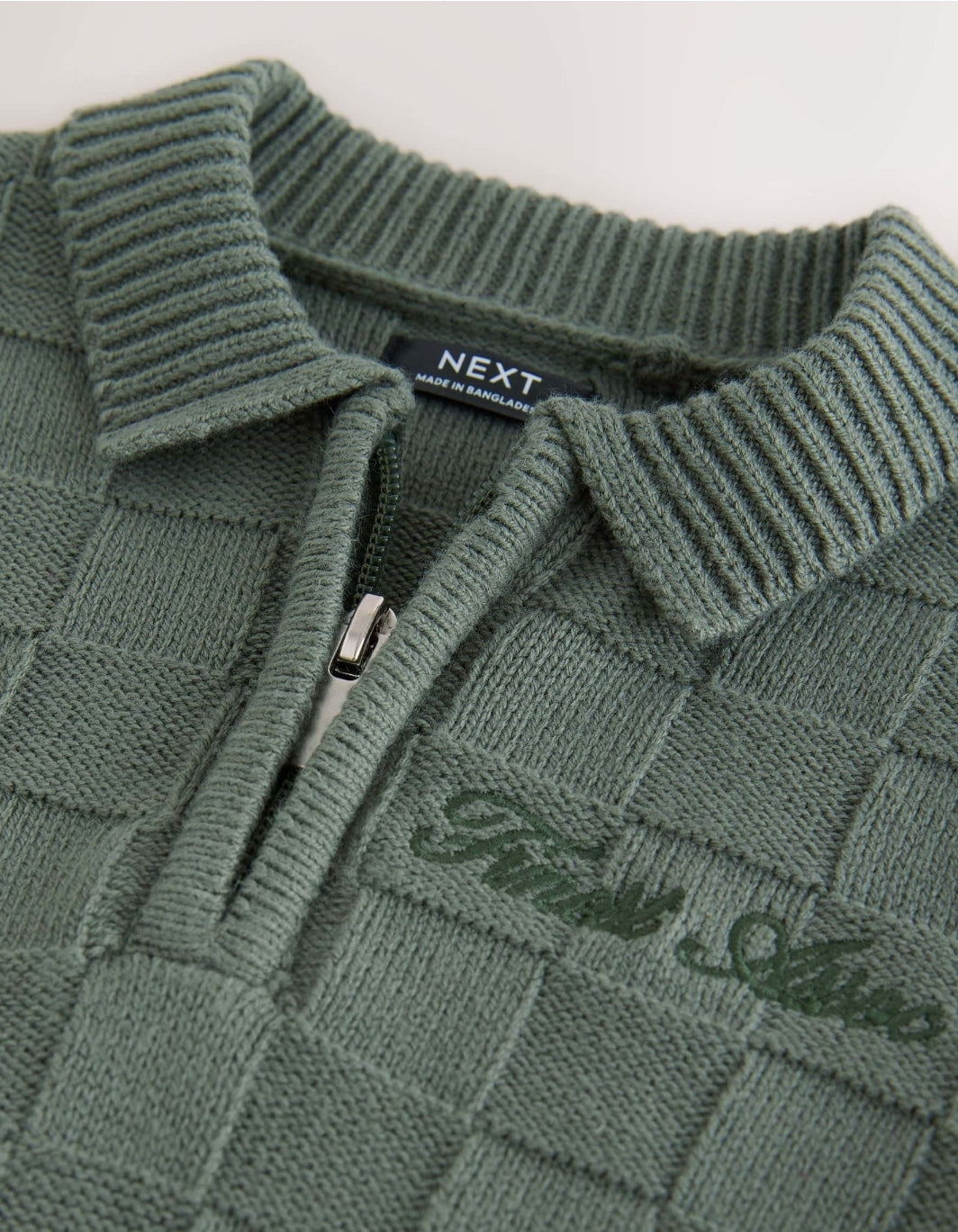 Green Textured Knitted Zip Neck
Polo Shirt